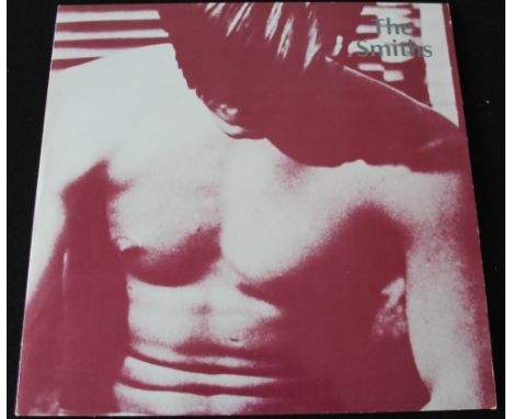 THE SMITHS - An exquisite and highly sought after copy of the band's S/T release, issued on multi-coloured splattered vinyl; 