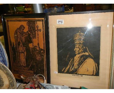 A framed and glazed portrait of Pope Leo XIII and another religious print.