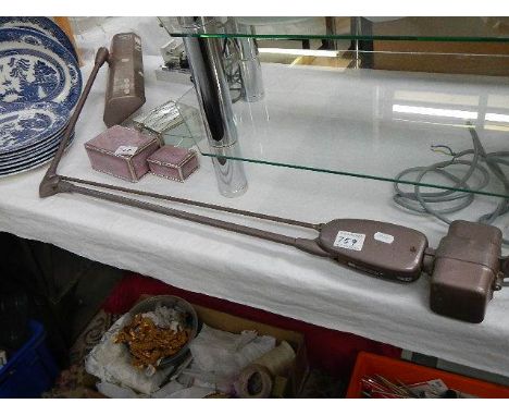 A vintage angle poise lamp.
