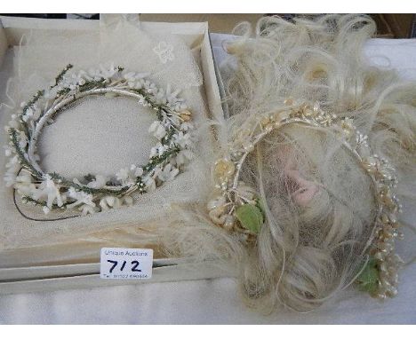 Two vintage wedding headresses and veils.