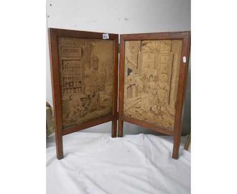 A two fold circa 1920's tapestry fire screen.