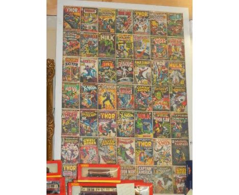 A framed and glazed print of Marvel comics.*Condition report*Each individual image 8.5cm x 12.5cm.Frame size 66cm x 97cm.Coll