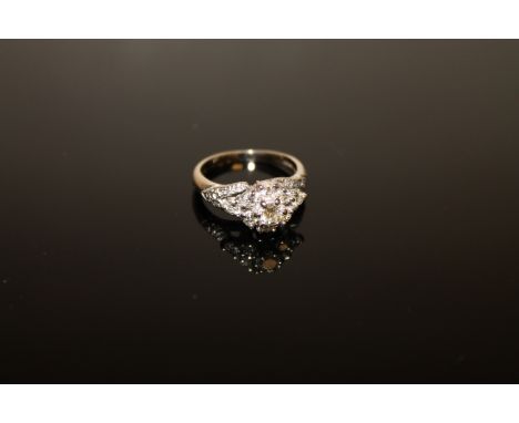 An 18ct gold diamond cluster ring, size I/J.