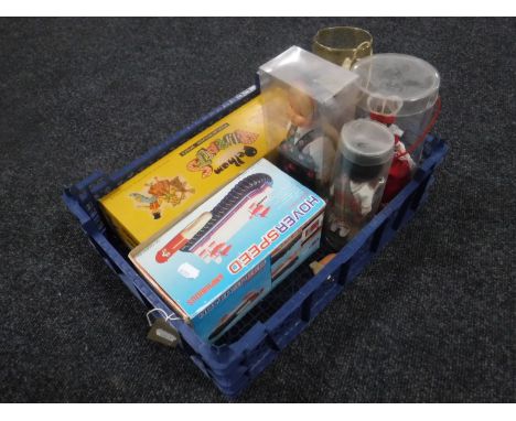 A crate of boxed Pelham puppet, boxed Hoverspeed hovercraft, collector's dolls