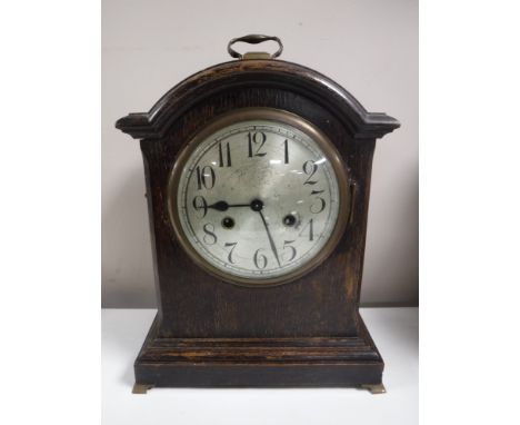 An oak cased Junghans mantel clock
