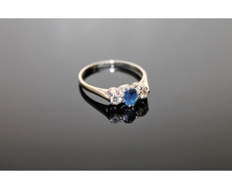 An 18ct gold sapphire and diamond ring