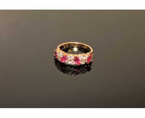 An 18ct gold ruby and diamond ring, size M/N