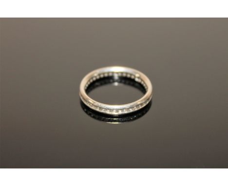 A platinum diamond eternity ring, size M CONDITION REPORT: The ring is in good condition. The inner shank is stamped '950' fo