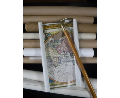 A brass headed walking stick and a quantity of rolled maps, prints, etc 