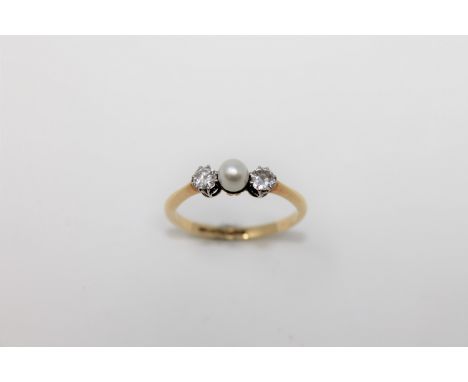 An 18ct gold pearl and diamond ring.