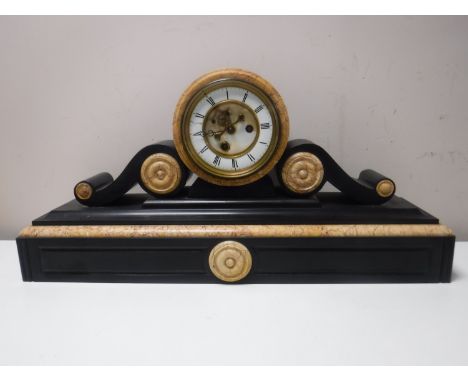 A Victorian marble mantel clock