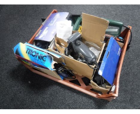 A collection of boxed and unboxed tools - Black &amp; Decker chain saw, Powercraft belt sander etc 