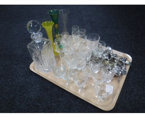 A tray of lead crystal decanter and assorted drinking glasses, plated teaspoons and three glass vases 