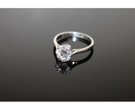 A superb quality diamond solitaire ring, the brilliant-cut stone weighing approximately 1.40 carat, size M