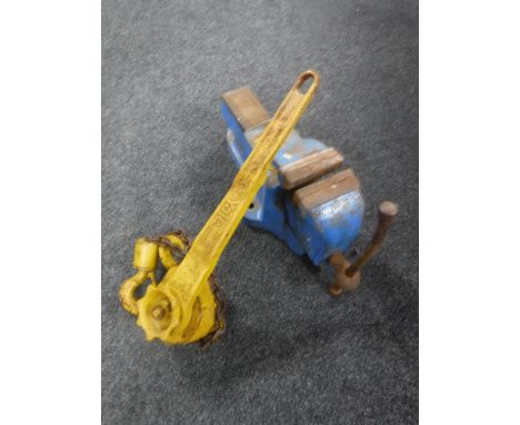 A 3/4 tonne chain hoist and a bench vice 