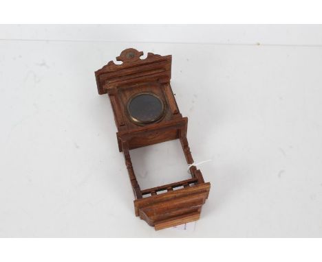 Novelty oak pocket watch holder, in the form of a clock case, with glazed panel, 21.5cm tall