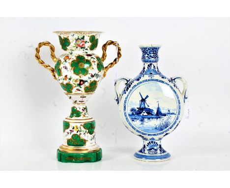 Delft pottery moon flask, painted with a canal and windmill to one side and flowers to the other, 27cm tall, together with a 