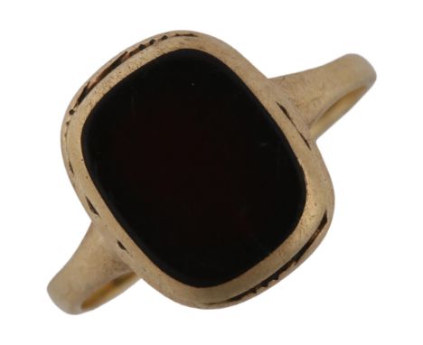 A 9ct gold onyx panel signet ring, setting height 11mm, size G, 1.6gRing is quite heavily worn, onyx has a faint hairline cra