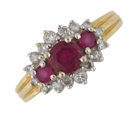 An 18ct gold ruby and diamond cluster ring, set with round-cut ruby and modern round brilliant-cut diamonds, setting height 1