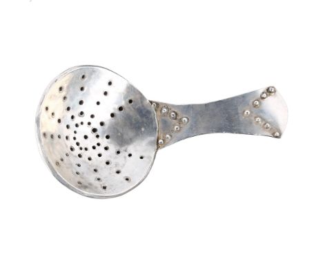 An Arts and Crafts unmarked silver tea caddy strainer spoon, length 10cmNo damage or repairs, only light surface wear, unmark