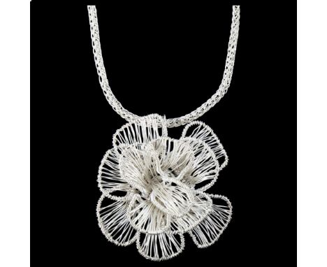 A large modern handmade sterling silver flowerhead pendant necklace, wirework design, by Claude Wilkes, hallmarks London 2017