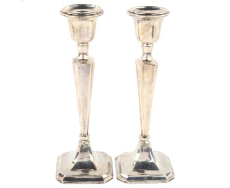 A pair of George V silver table candlesticks, by Robert Pringle & Sons, hallmarks Chester 1917, height 20.5cm, loaded base1 l