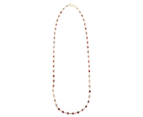 A modern 14ct gold ruby line necklace set with round-cut rubies, necklace length 46cm, 4.9gNo damage or repairs, all stones p