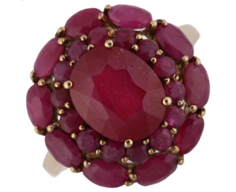 A modern 9ct gold ruby cluster ring, 19.8mm, size R, 5.5gNo damage or repairs, all stones present, rubies are quite heavily i