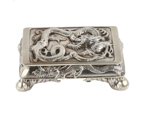 A Chinese export silver dragon double deskstand, by Wang Fat circa 1900, relief embossed dragon and pearl lid with dragon bor