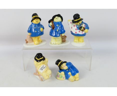 Coalport - Five Paddington Bear figures comprising Eats An Apple, The Chimney Sweep, Papers His Room, Shopping and Takes It E