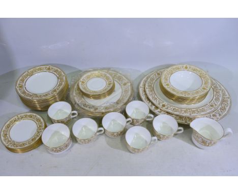 Royal Worcester - A large Royal Worcester 1966 Hyde Park ceramic gold and white tea/dinner set. Includes teacups, saucers, su