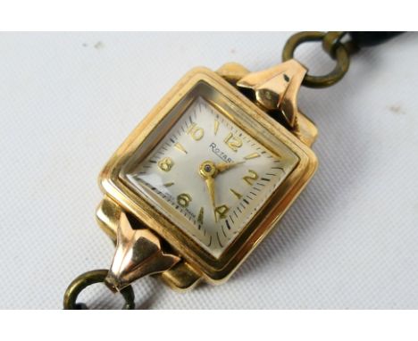 A 9ct gold cased Rotary wrist watch on black leather strap. [W]