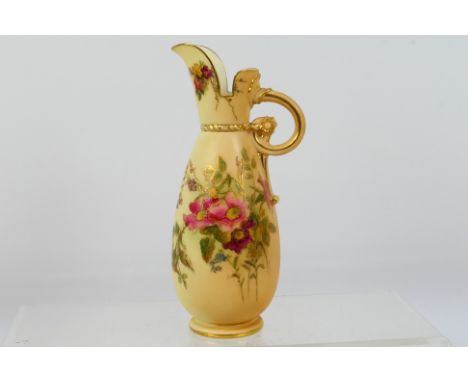 A Royal Worcester blush ivory ewer, shape 1065, decorated with floral sprays and gilt and having scroll handle, c.1913, appro