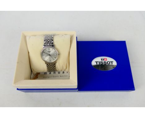 A stainless steel Tissot wrist watch contained in original box with paperwork. [W]Condition Report: Hands and date set fine, 