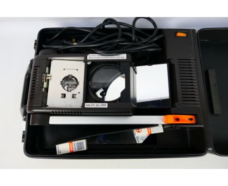 An Anders & Kern Portable 300 overhead projector in carry case. [W]