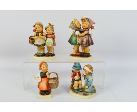Goebel - Four Hummel figures / groups to include # 376 Little Nurse, # 371 Daddy's Girls, ' 196 Telling Her Secret and other,