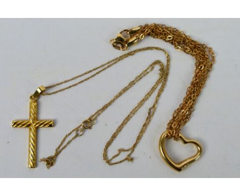 A 9ct yellow gold bracelet with heart pendant and a 9ct yellow gold crucifix pendant on 48 cm (l) yellow metal chain, approxi