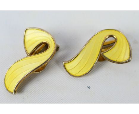 Ivar T Holth - A pair of gilt metal and enamel ear clips, stamped 925S Sterling Norway, 2.5 cm (l)Condition Report: Rubbing t