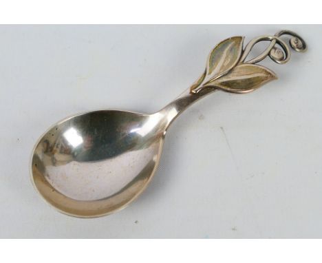 A Danish silver caddy spoon by Carl M Cohr with stylised leaf handle, 1938, assay master's mark for Johannes Siggaard, 10.5 c