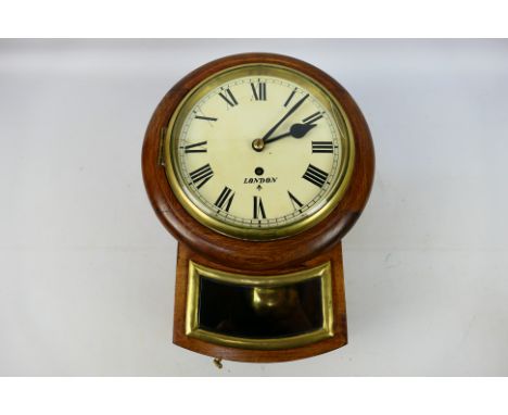 A fusee drop dial wall clock, stained and polished case, white dial marked with the military arrow mark and London, opening b