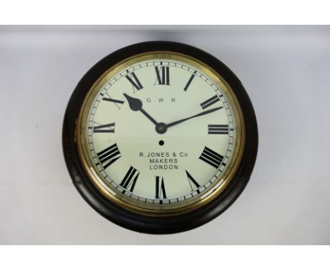 A 12 inch fusee dial clock, dark stained case, white dial marked for GWR and R Jones & Co, Makers, London, opening brass beze