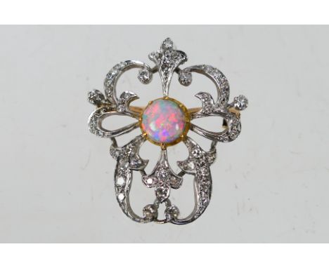 A diamond and opal pendant / brooch, 3 cm (l), approximately 5.7 grams. [W]Condition Report: No apparent hallmarks