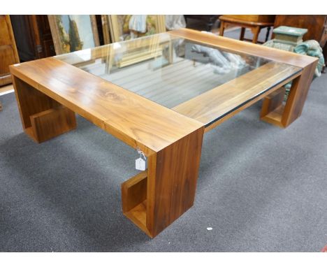 A contemporary hardwood and plate glass coffee table, length 160cm, depth 120cm, height 45cm