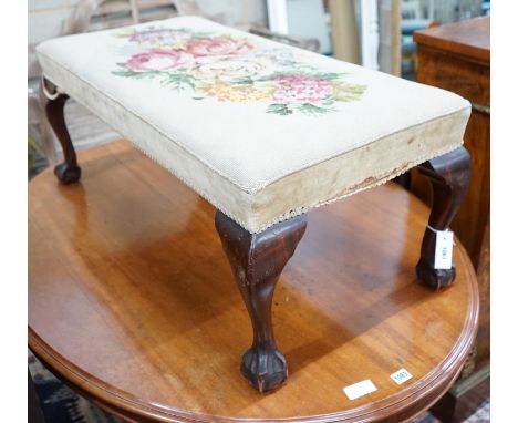 A George II style mahogany dressing stool with tapestry seat width 100cms, depth 50cms, height 40cms.