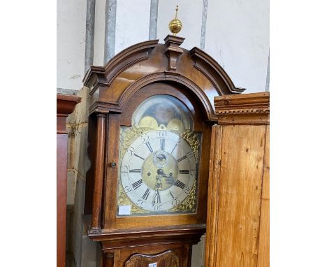 A George III mahogany eight day longcase clock, with an arched brass dial, height 246cm