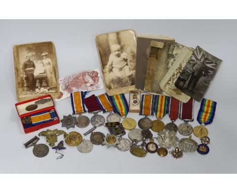 An India campaign medal and a long service and good conduct medal both awarded to 4838 PTE W.J. MORRIS 2D BN RYL SUSS REGT, a