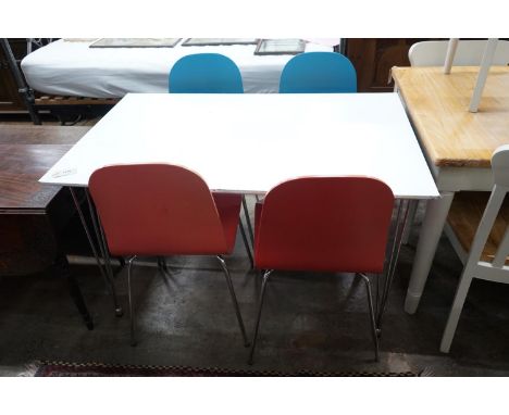 A contemporary John Lewis painted ply and chrome table and four chairs, table width 120cms, depth 76cms, height 73cms.