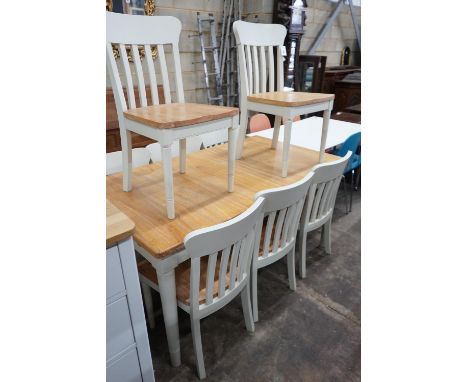 A modern John Lewis part painted extending dining table and eight matching chairs, table width 209cms extended, depth 90cm, h