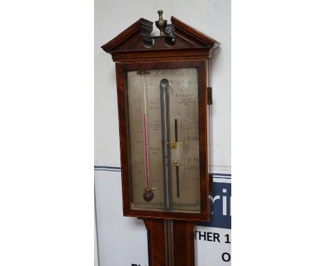 Cattely &amp; Co, Holborn, London. A George III feathered walnut stick barometer, height 98cms. with bone inset cistern Heigh