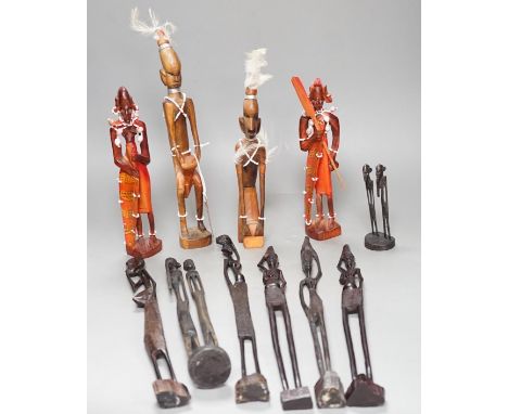 12 African carved wood stick figures, tallest 38cms high